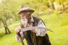 28968253-old-farmer-with-beard-preparing-his-scythe-before-using-to-mow-the-grass-traditionally.jpg