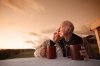 elderly-couple-sunset-coffee.jpg