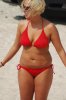 Cute curvy chubby blonde woman in red bikini.jpg