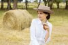 3400688-A-typical-Argentinean-gaucha-cowgirl-drinking-yerba-mate-Stock-Photo.jpg