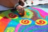 stock-photo-24718606-artist-doing-a-bright-chalk-street-painting.jpg