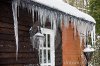 icicles-hanging-drainpipe-ouside-house-12648396.jpg