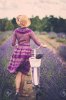 42104585-Woman-in-purple-dress-and-hat-with-retro-bicycle-in-lavender-field-Stock-Photo.jpg