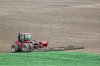 red-tractor-plowing-palouse-hard-work-60822248.jpg