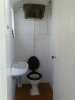 450px-Old_toilet_with_elevated_cistern_and_chain.jpg